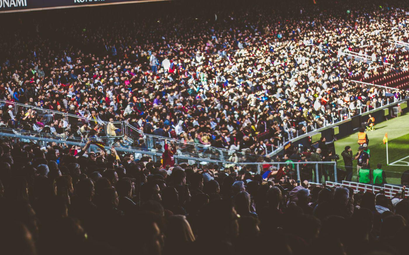 Fans light up the stands on derby night